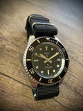 MWC 24 Jewel 1982 Pattern 300m Automatic Military Divers Watch with Sapphire Crystal on a NATO Webbing Strap (Date Version)