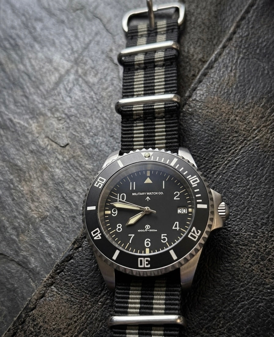 MWC 24 Jewel 1980 Pattern 300m Automatic Military Divers Watch with Sapphire Crystal and Ceramic Bezel on a NATO Webbing Strap (With Date)
